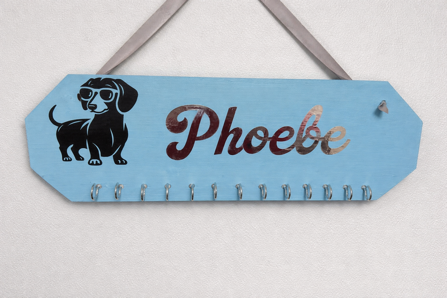 Personalised medal hangers , for any sports